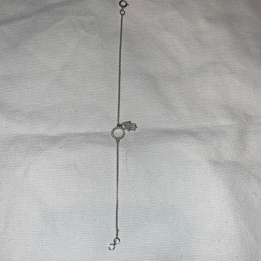 White gold in crusted diamond bracelet with hamsa